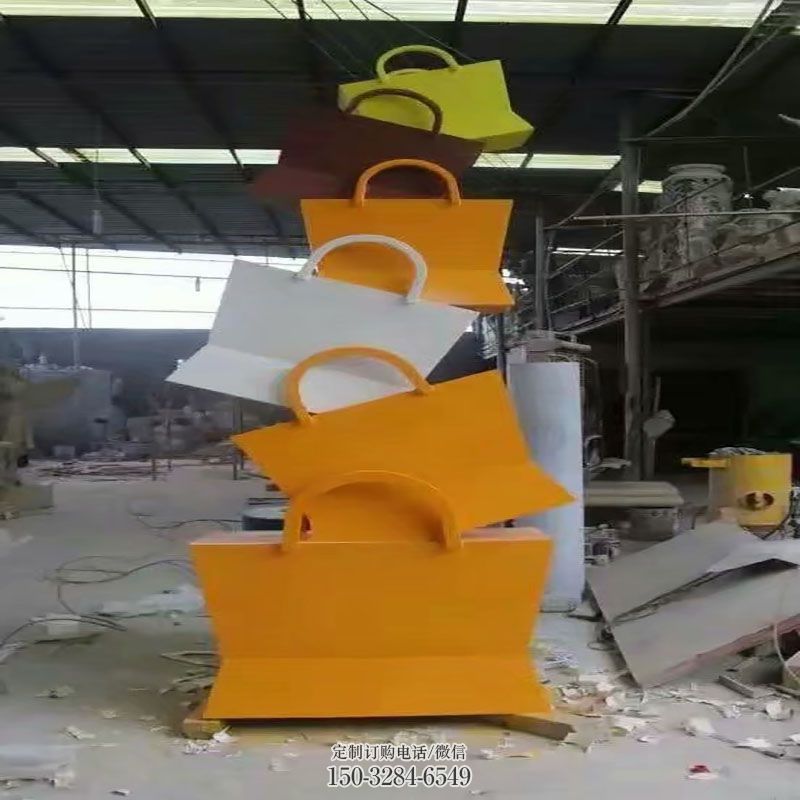 哈密烤漆挎包雕塑制造商,室外软装,景观挎包雕塑制作 哈密烤漆挎包雕塑制造商,室外软装,景观挎包雕塑制作