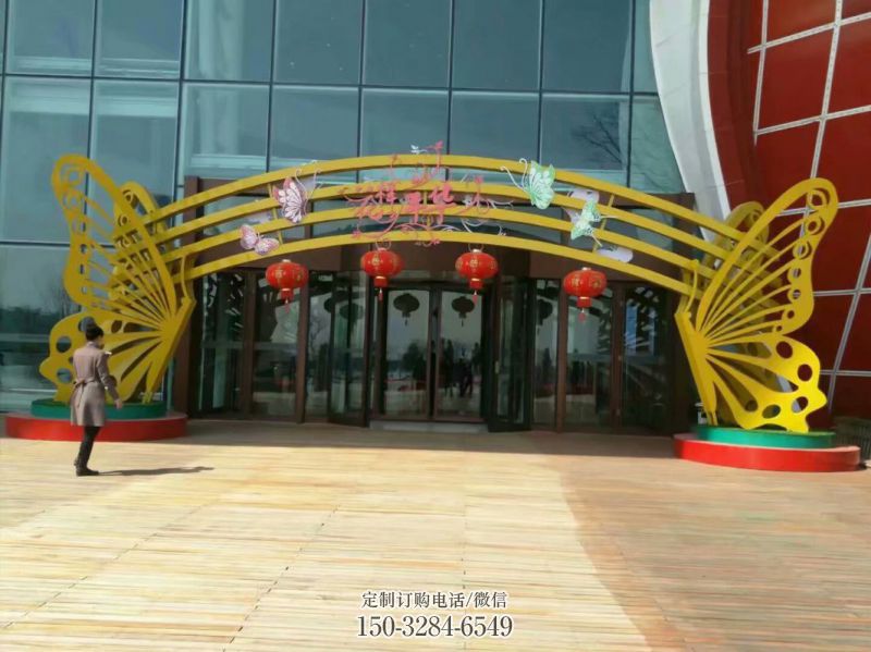 乌鲁木齐蝴蝶拱门雕塑,镂空烤漆效果,不锈钢小区标识雕塑 乌鲁木齐蝴蝶拱门雕塑,镂空烤漆效果,不锈钢小区标识雕塑